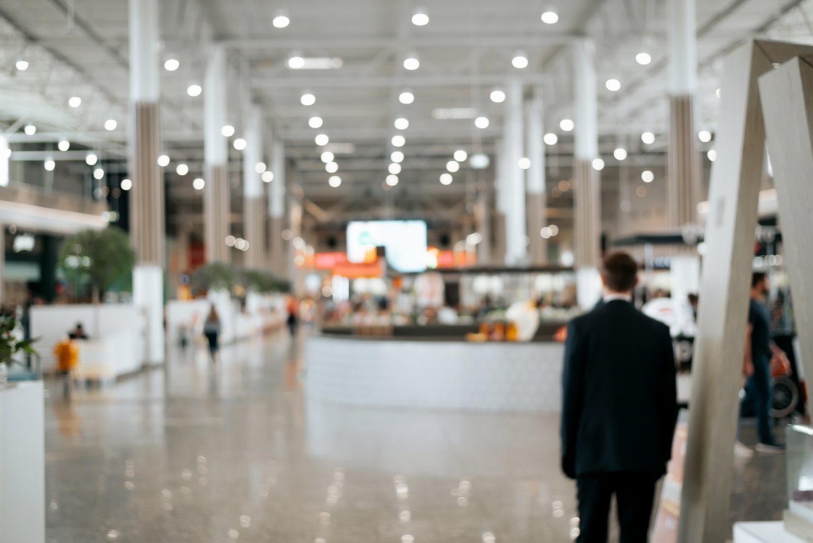 Visitors in a spacious exhibition hall